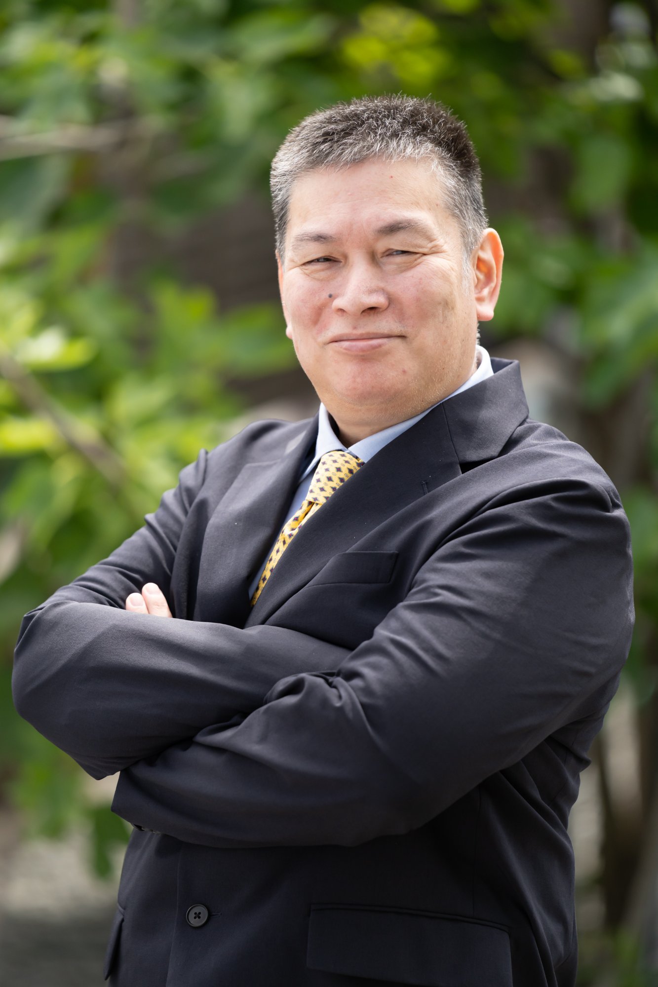 代表 岩崎哲也